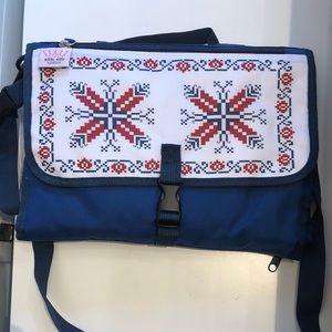 Diaper changing pad clutch